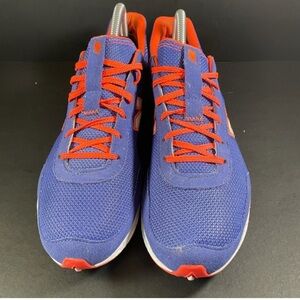 Women's New Balance Purple and Orange Turf shoes size 8